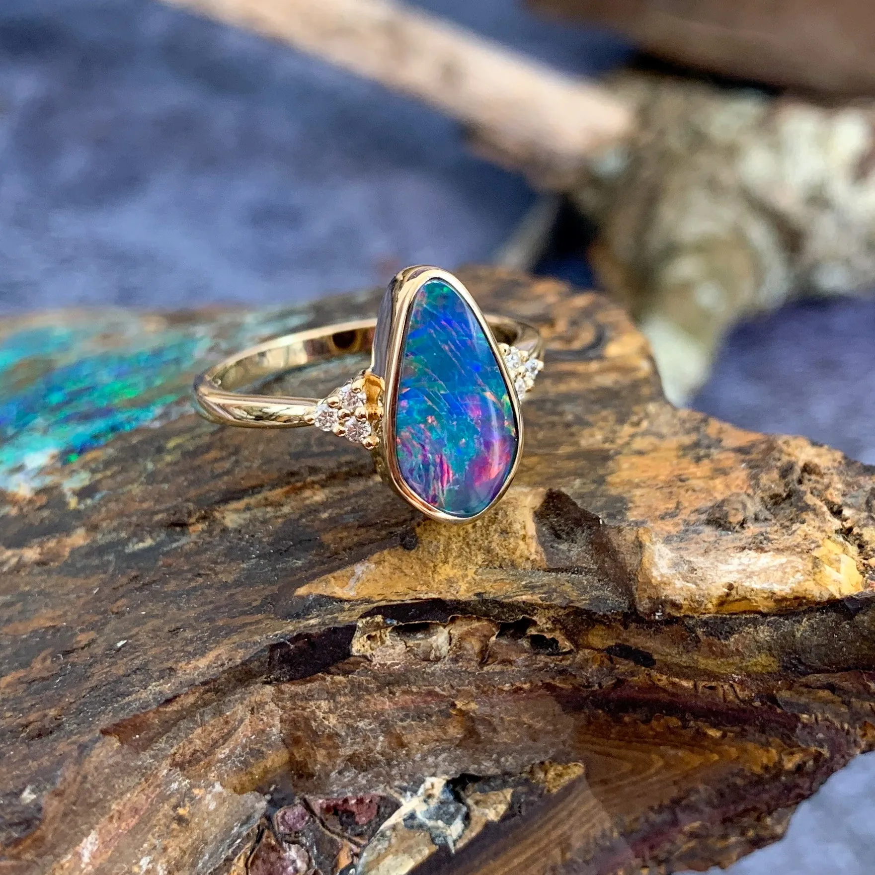 14kt Yellow Gold Opal doublet red flash with diamonds ring
