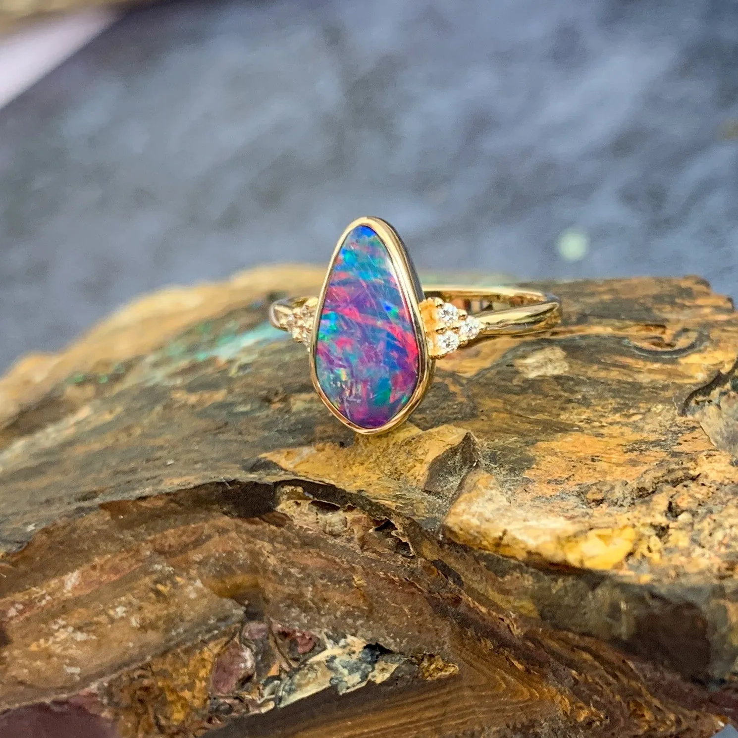 14kt Yellow Gold Opal doublet red flash with diamonds ring