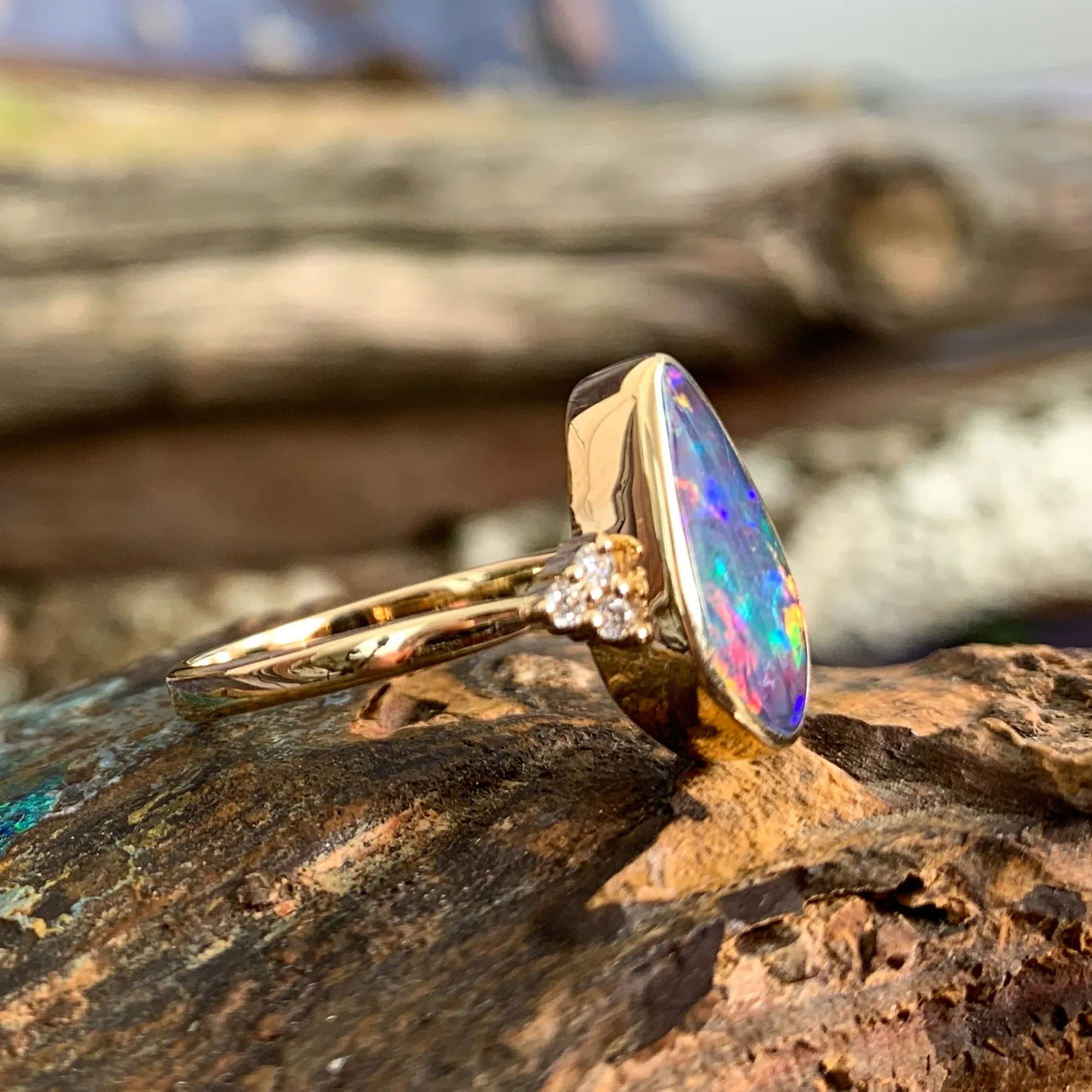 14kt Yellow Gold Opal doublet red flash with diamonds ring