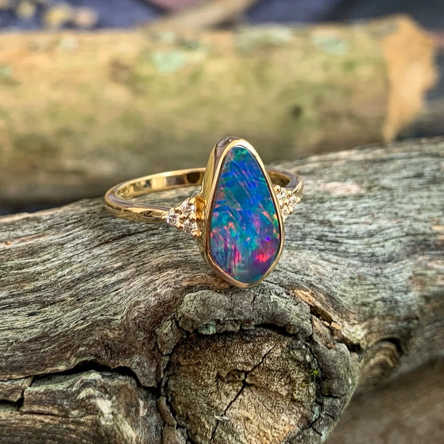 14kt Yellow Gold Opal doublet red flash with diamonds ring