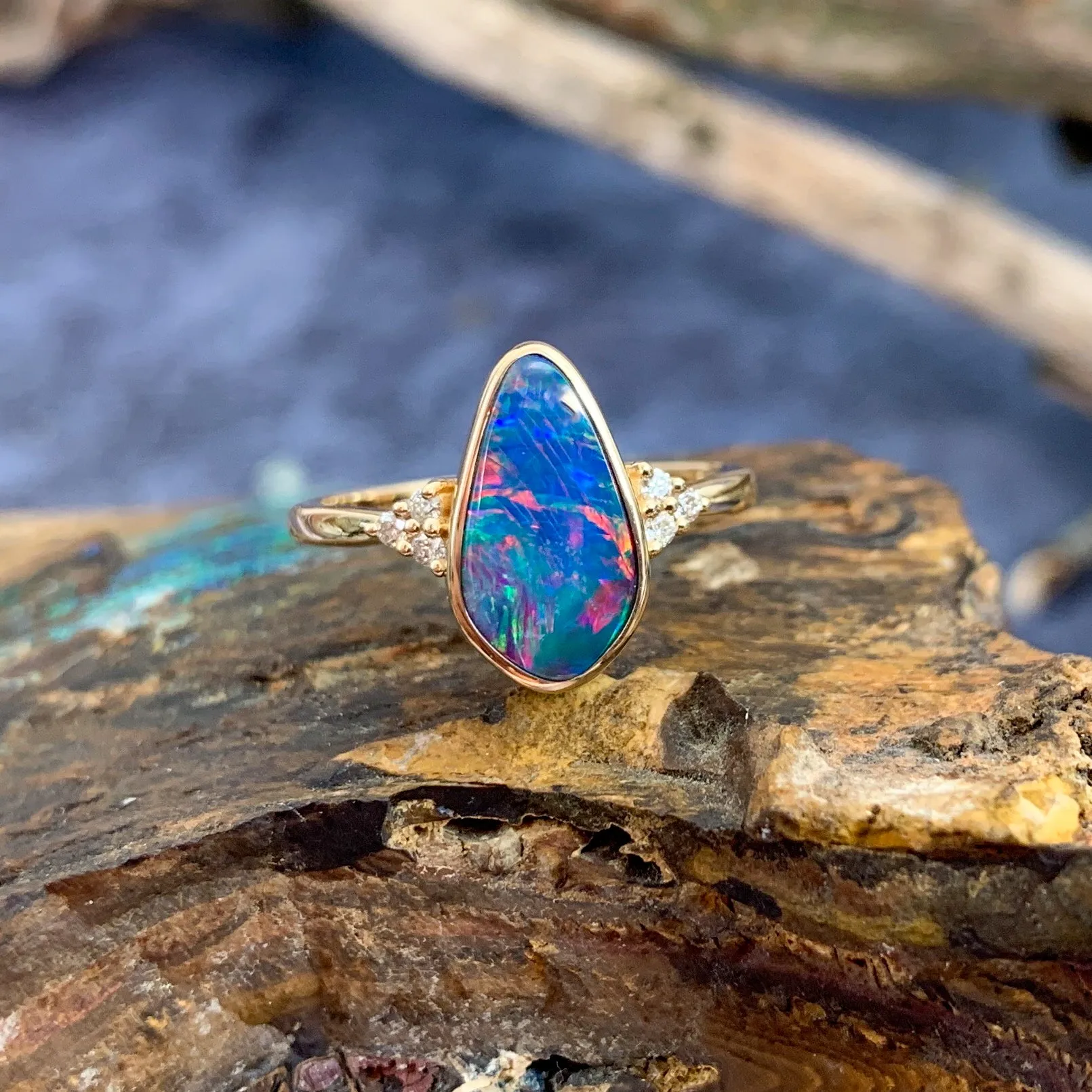 14kt Yellow Gold Opal doublet red flash with diamonds ring